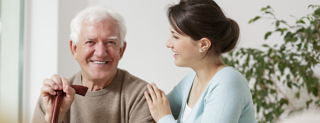 Happy grandfather and granddaughter spending time together